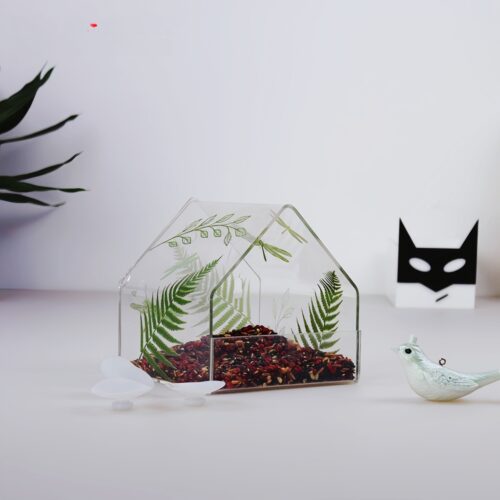 Clear View Window Bird Feeder  The grass green theme exudes a natural atmosphere